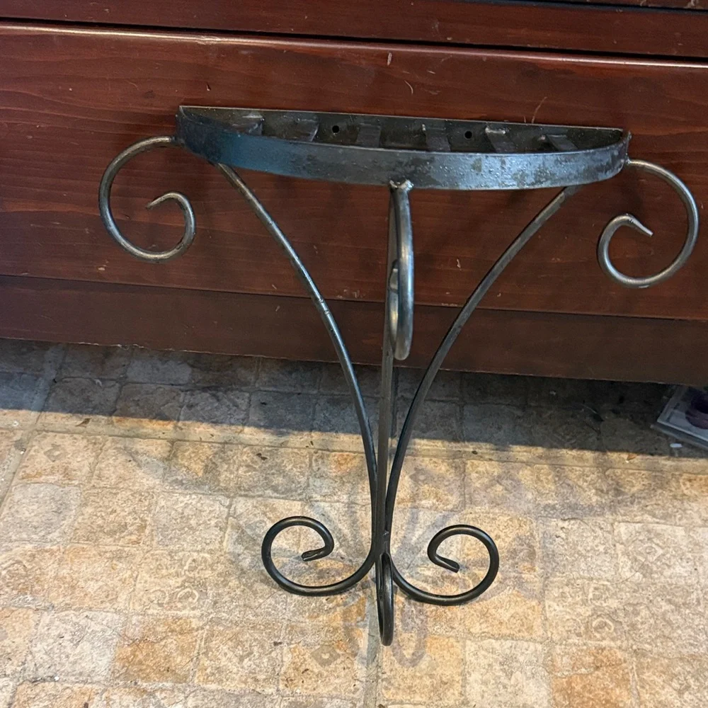 Elegant bronze metal wall shelf